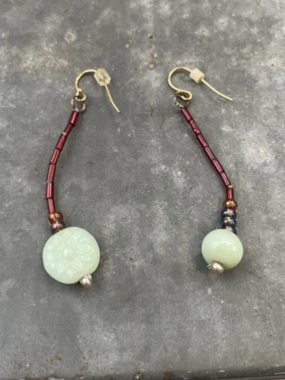 Artisan green and red beaded Drop Earrings with flower etching